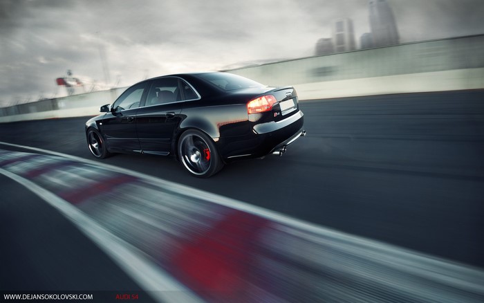 Black Audi RS4 on a Racetrack