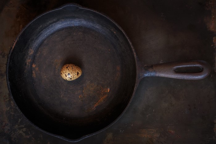 Quail egg in a cast iron skillet