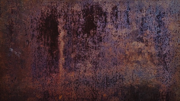 Rusty metal texture with urban decay
