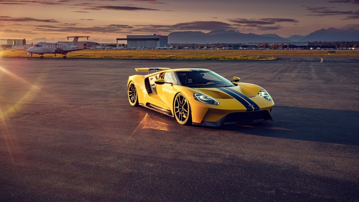 Yellow Ford GT Mk II with Blue Stripes at Airport Sunset