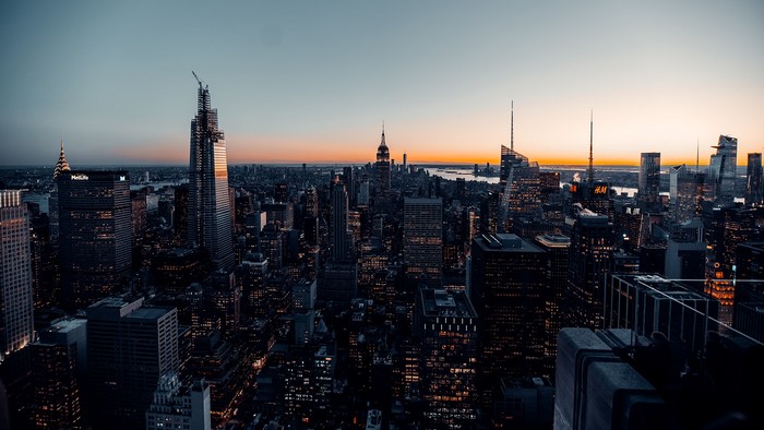 New York City skyline at sunset with lights