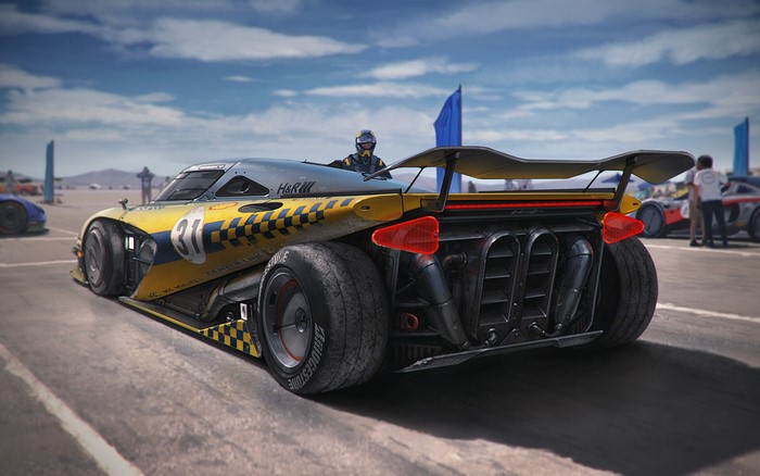 Yellow and blue race car with number 31 on track