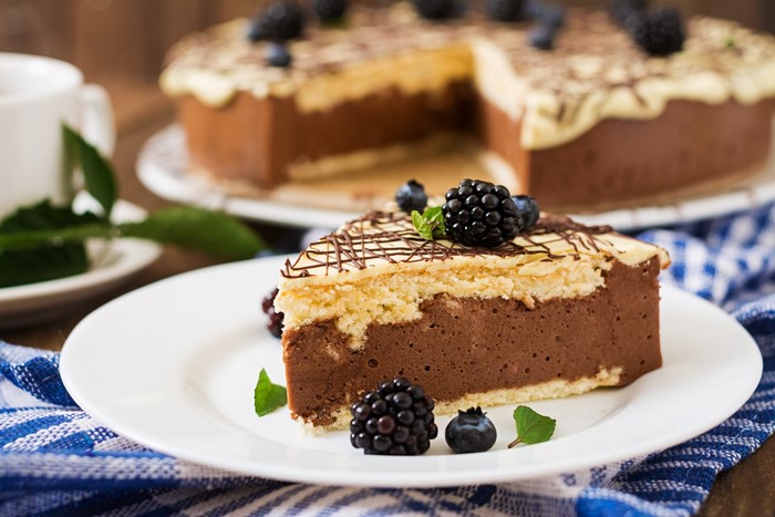 Chocolate mousse cake with berries and mint