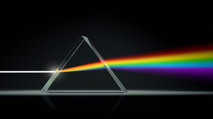 4K prism refracting light into a spectrum