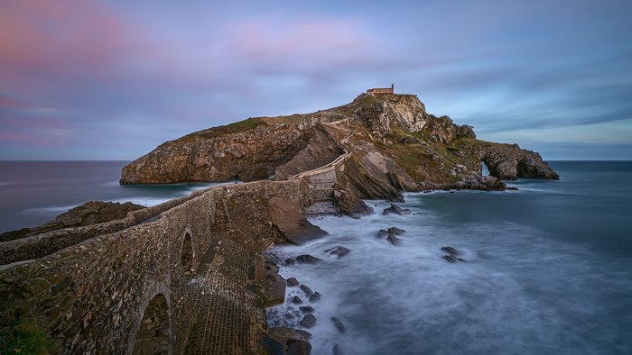 Gaztelugatxe island with stone bridge at dawn, Spain