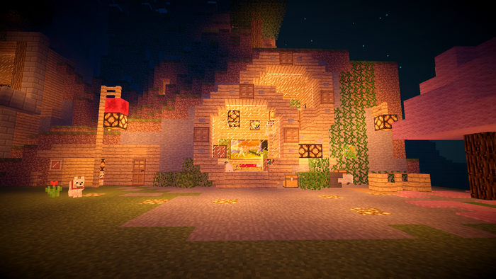 Minecraft screenshot of a wooden house at night