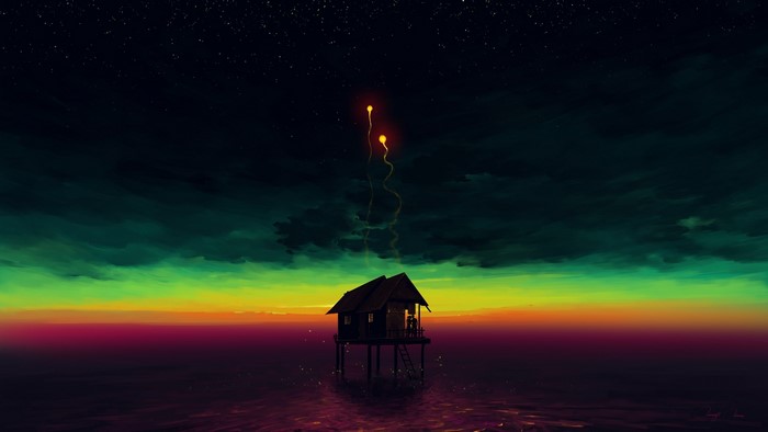 Couple in a house with flares over the sea at sunset