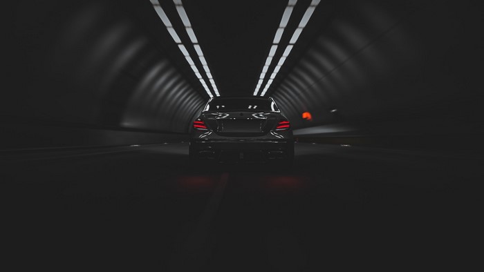 Black Mercedes-Benz AMG in a tunnel