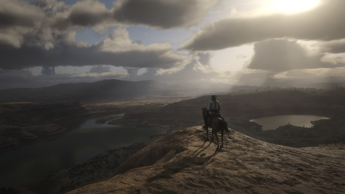 John Marston from Red Dead Redemption 2 on a cliff