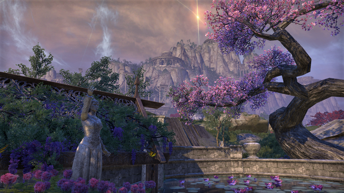 The Elder Scrolls Online landscape with statue and cherry blossoms