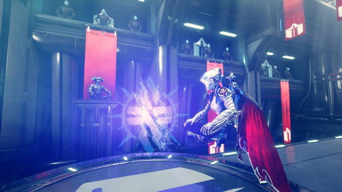 Warframe character meditating near a glowing artifact