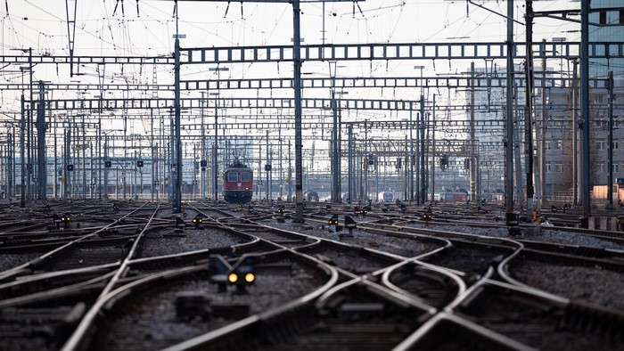 4K rail yard with trains and overhead wires