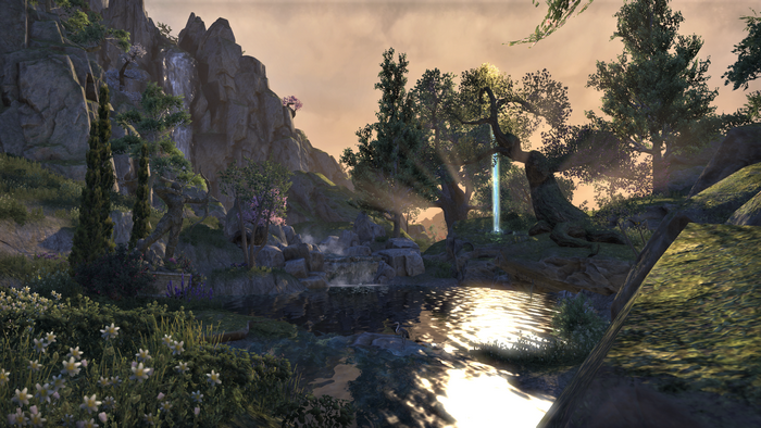 The Elder Scrolls Online landscape with waterfall and ancient tree