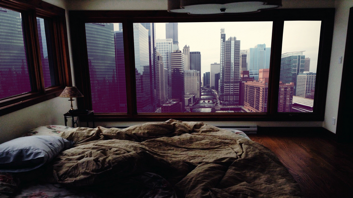Bedroom with a cityscape view