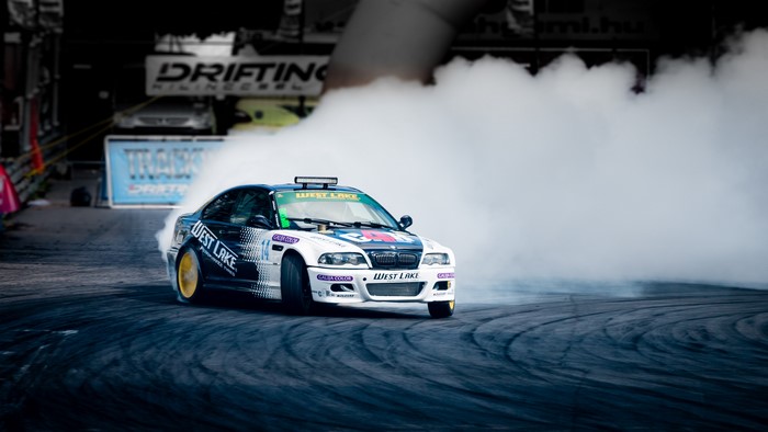 BMW drift car with smoke on race track