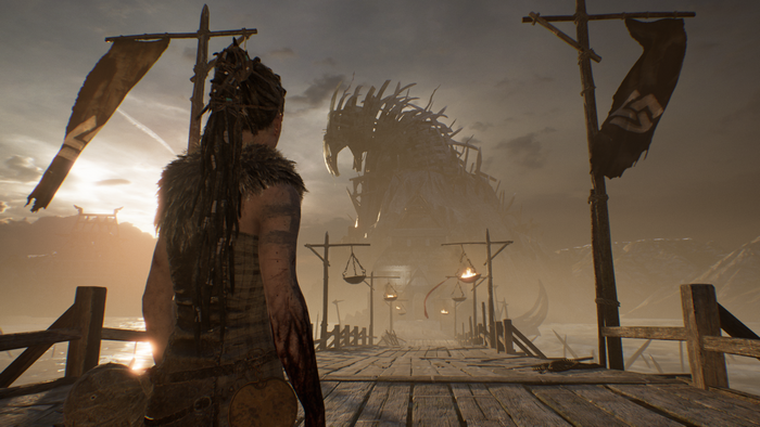 Senua from Hellblade: Senua's Sacrifice facing a dragon