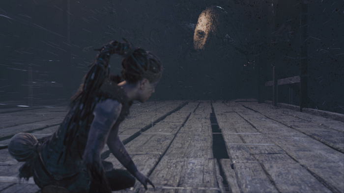 Senua from Hellblade: Senua's Sacrifice on a wooden platform