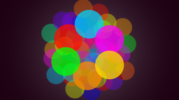 Colorful bokeh circles on dark background