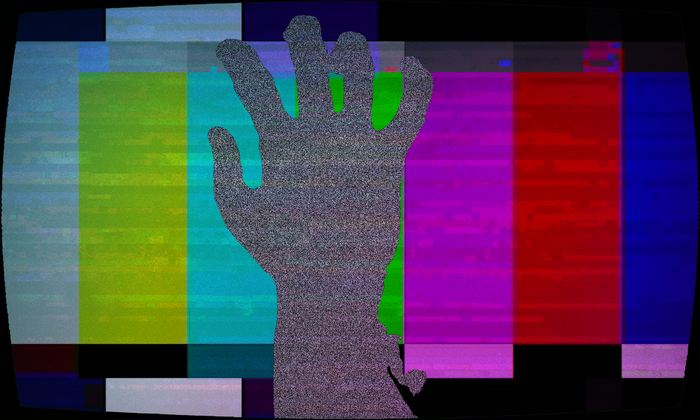 Hand over TV test pattern