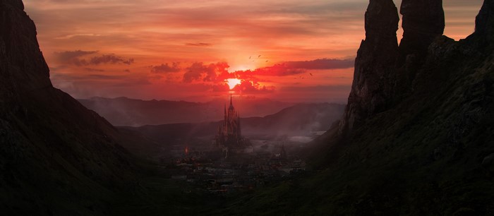 Fantasy city with castle at sunset