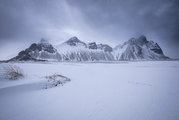 Snowy mountains and frozen landscape in Iceland