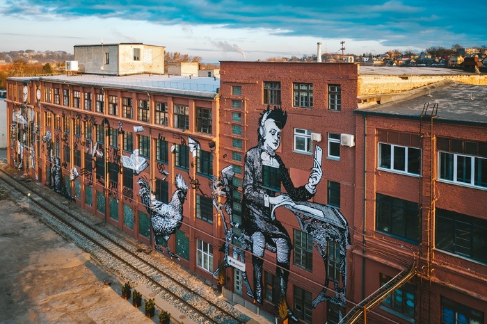 Graffiti on a brick building in Kaunas