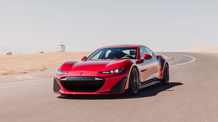 Red Drako GTE electric car on a race track