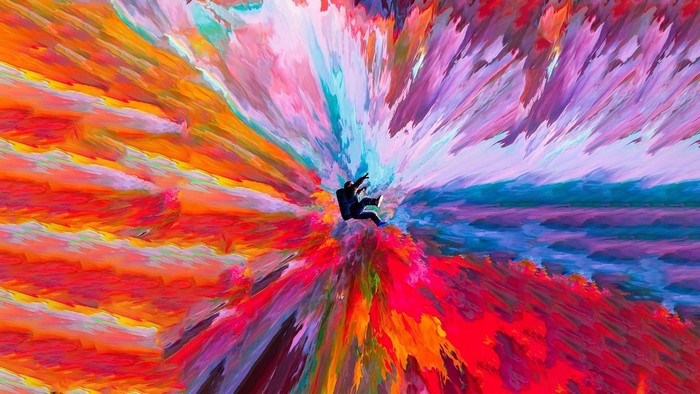 Astronaut falling through colorful psychedelic explosion