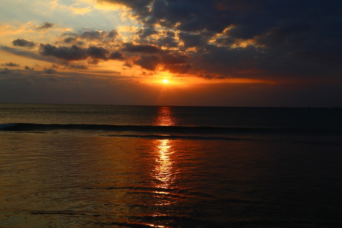 4K sunset over the sea with clouds