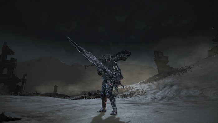 Dark Souls 3 character with large sword in wasteland