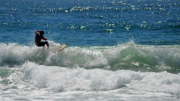 Surfer riding a wave
