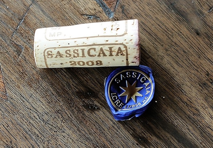 Sassicaia 2008 wine cork and seal on wood