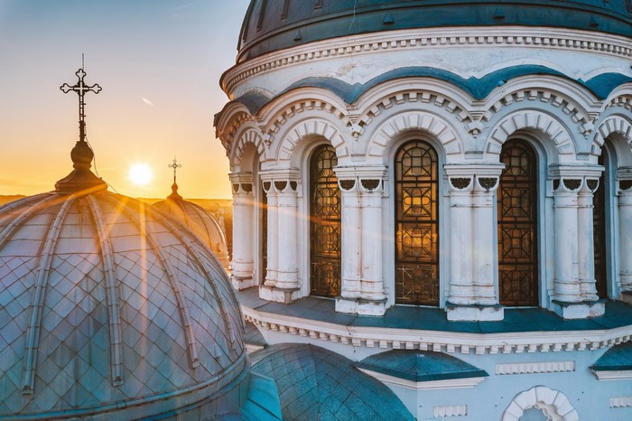 Christ's Resurrection Cathedral domes and crosses at sunset