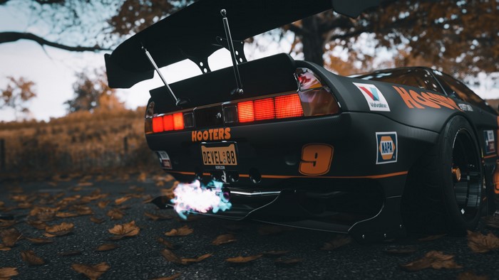 Honda NSX with Hooters livery and exhaust flare