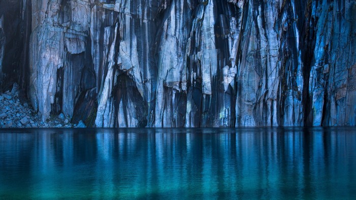 Precipice Lake cliff face and reflection
