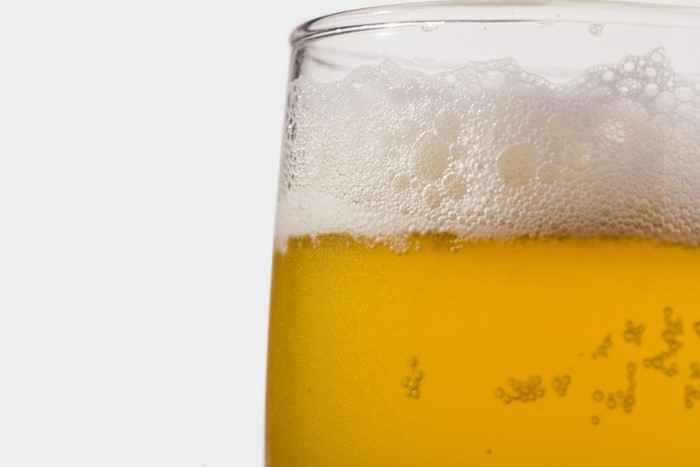 Beer in a glass with foam