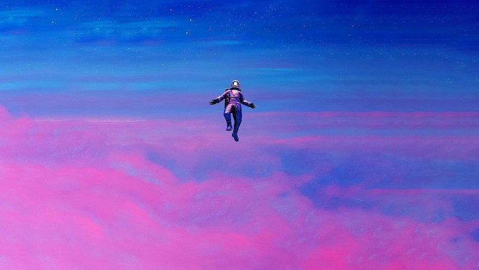 Astronaut floating in a colorful sky with clouds