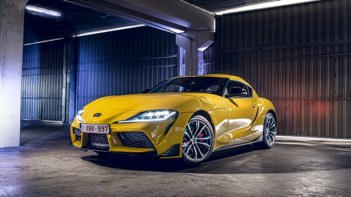 Yellow Toyota Supra in a Garage
