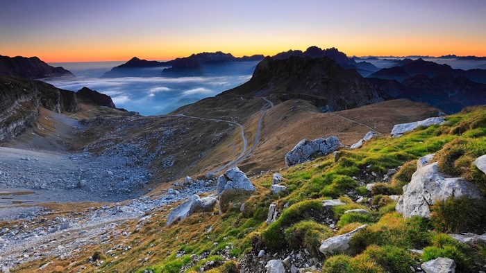 Mountain landscape with mist and sunset in Slovenia