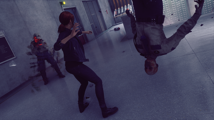 Jesse Faden from Control in a chaotic scene