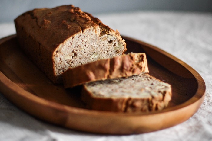 Loaf of bread on a wooden plate