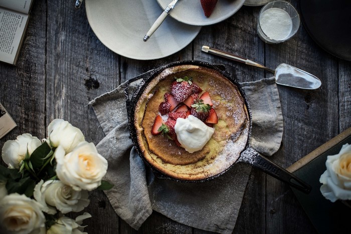 Dutch baby pancake with strawberries and cream