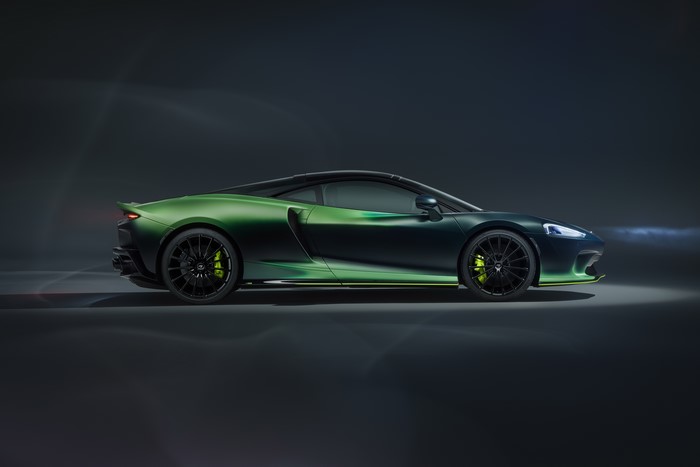 4K side view of a green McLaren GT supercar