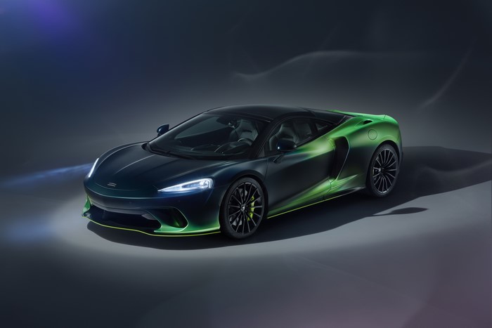 McLaren GT supercar with green and black paint