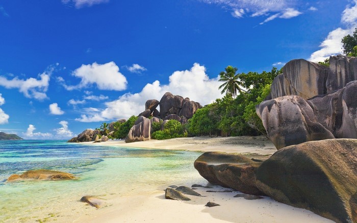 Tropical beach with granite boulders and turquoise water