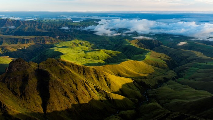 Aerial view of Drakensberg mountains and clouds in South Africa