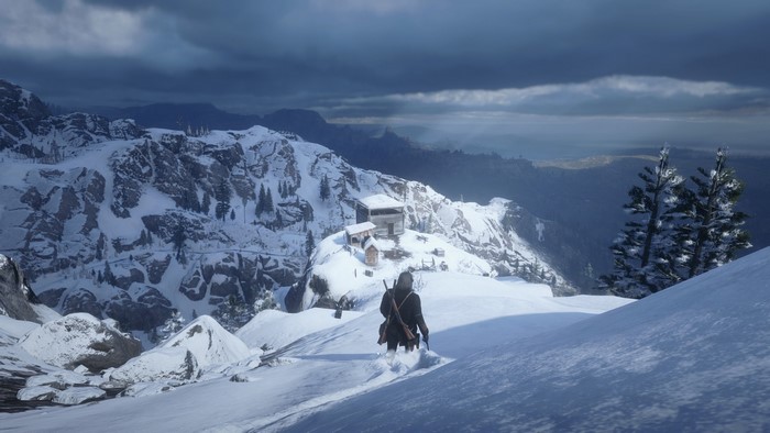 John Marston in Red Dead Redemption 2 snowy mountains