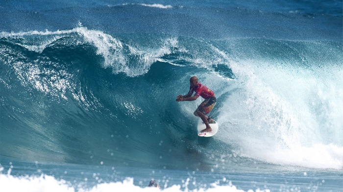 Surfer riding a wave
