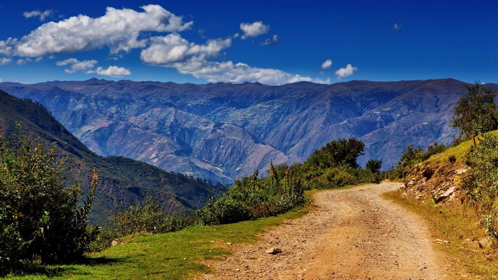 Dirt road winding through mountains in Peru