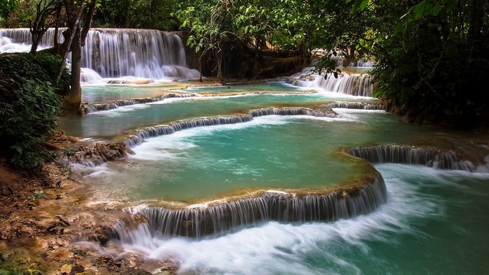 Kuang Si Falls in Laos with turquoise water